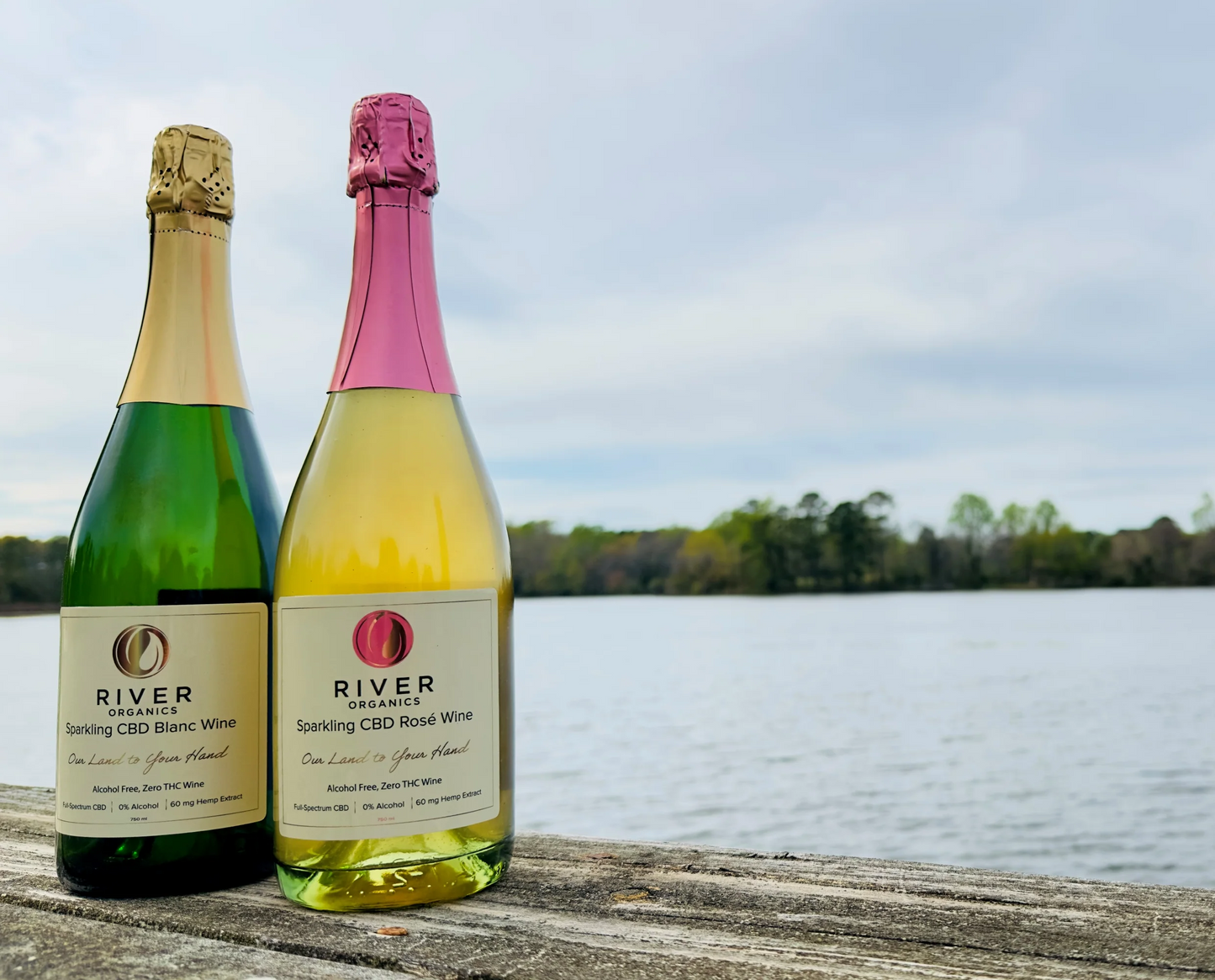 cbd sparkling blanc and cbd sparkling rose on dock near water