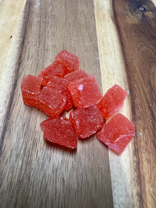 Strawberry Lime cbd gummies on wooden plank