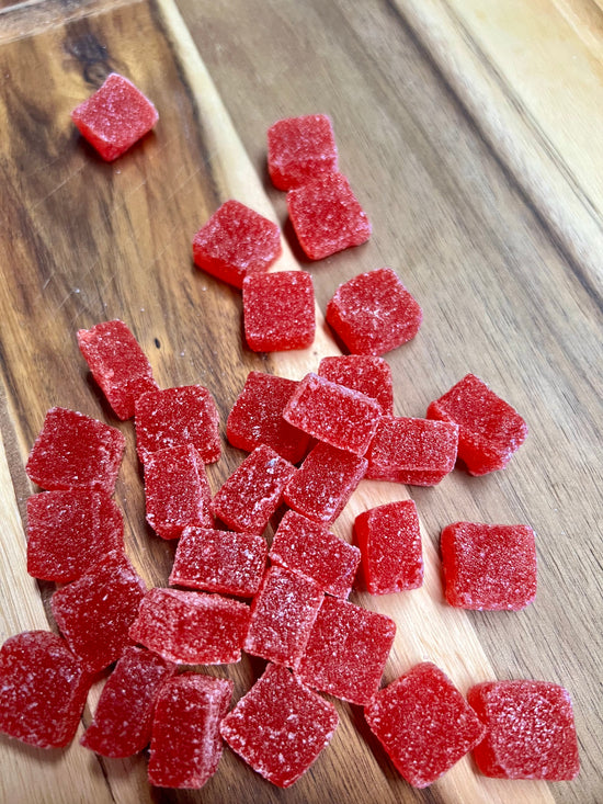 Cherry Limeade cbd gummies on wooden plank