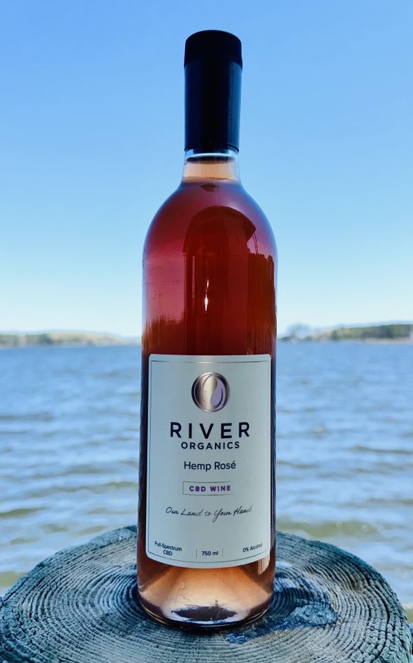 cbd rose on dock by the water