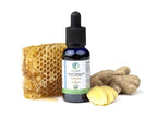 ginger honey tincture with honeycomb and ginger root